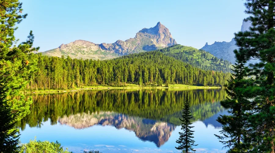 Mountain peak and clean lake. Ergaki Ridge. Western Sayan. Russia